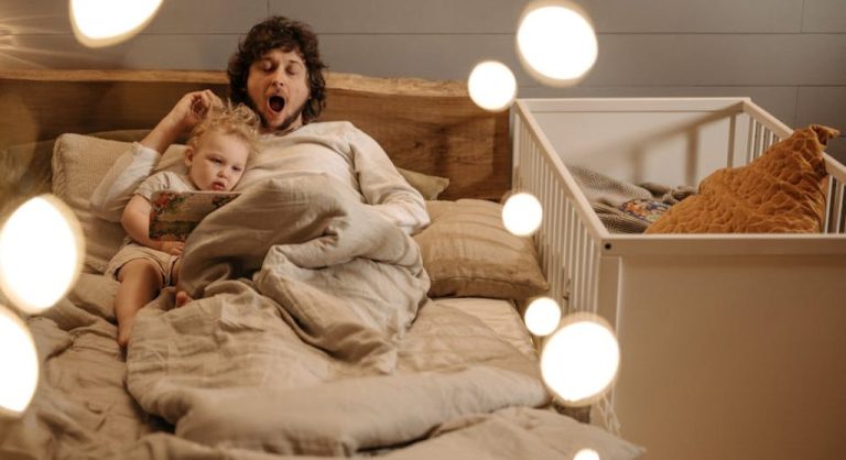 family reading together in bed