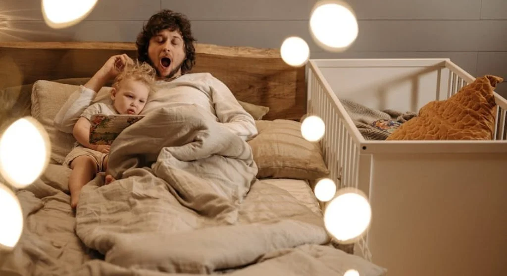 family reading together in bed