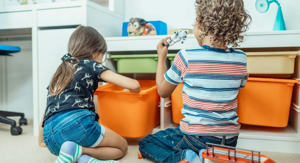 parent & child cleaning playroom