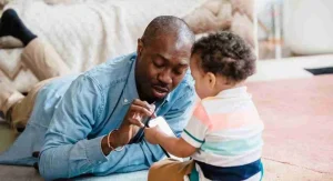 Parent using fewer calm words while speaking to a child at home