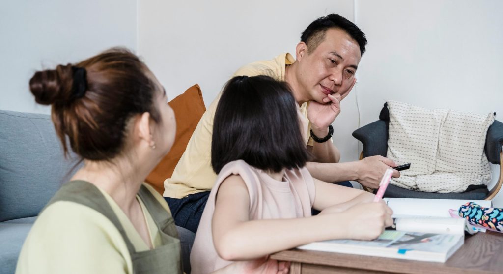 parent showing child daily routine step