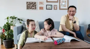 parent helping child with homework