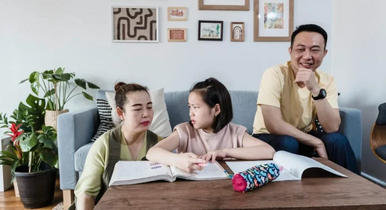 parent helping child with homework