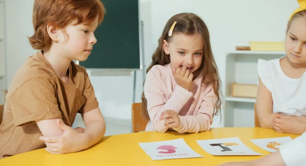 children waiting calmly in classroom