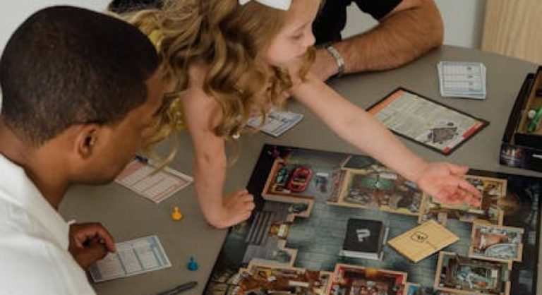 family playing board games together