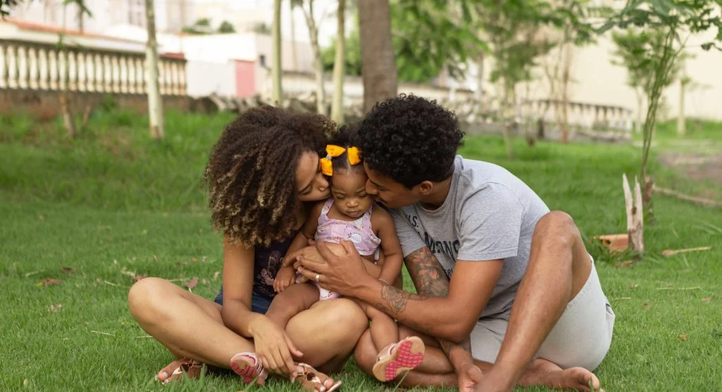 Parent and child sharing a quiet closing moment after a family tradition
