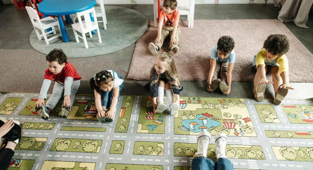 child waiting calmly for turn