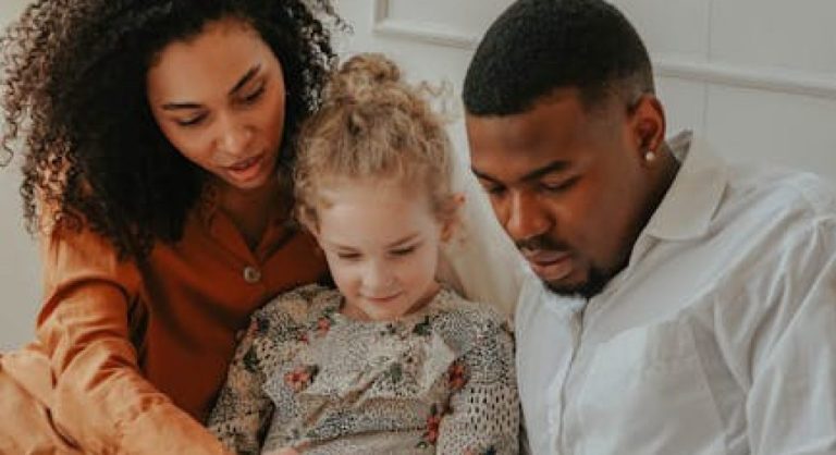 family reading together at home