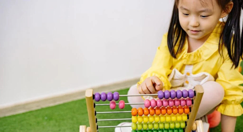 kid learning new skills at desk