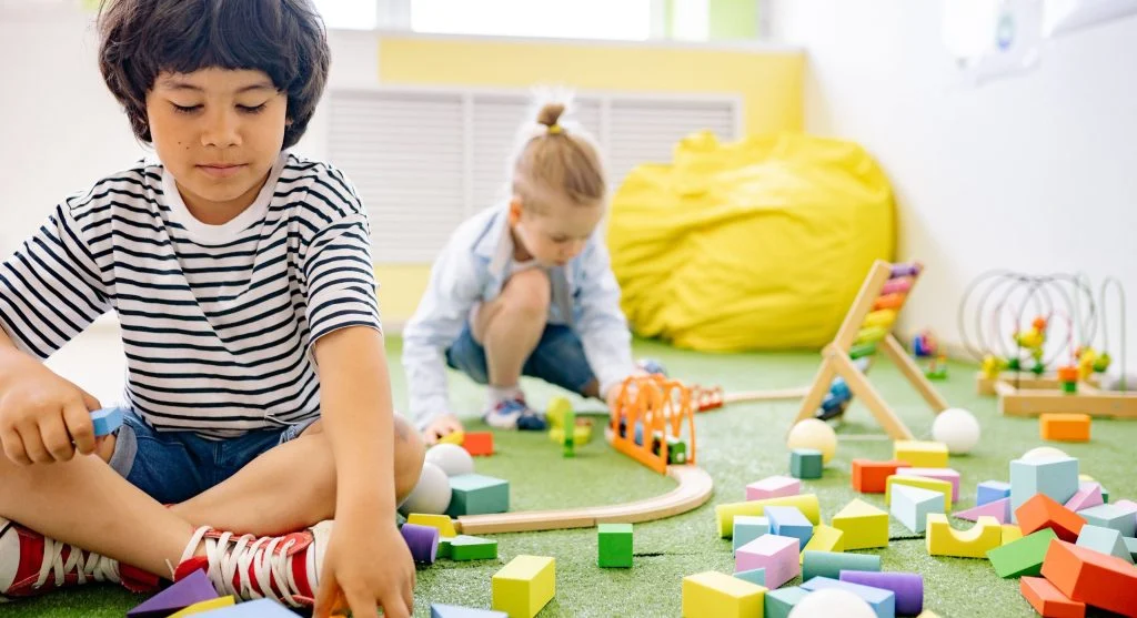 Child looking frustrated when group play does not follow the planned idea