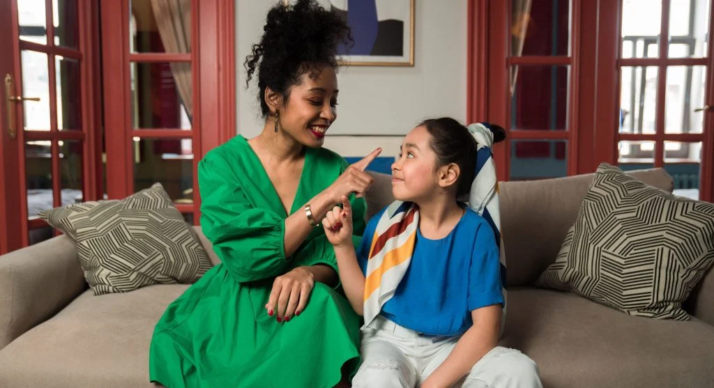 Child paying close attention to exact wording during a conversation at home