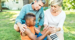 Parent using calm clear language to guide a child during a difficult moment at home
