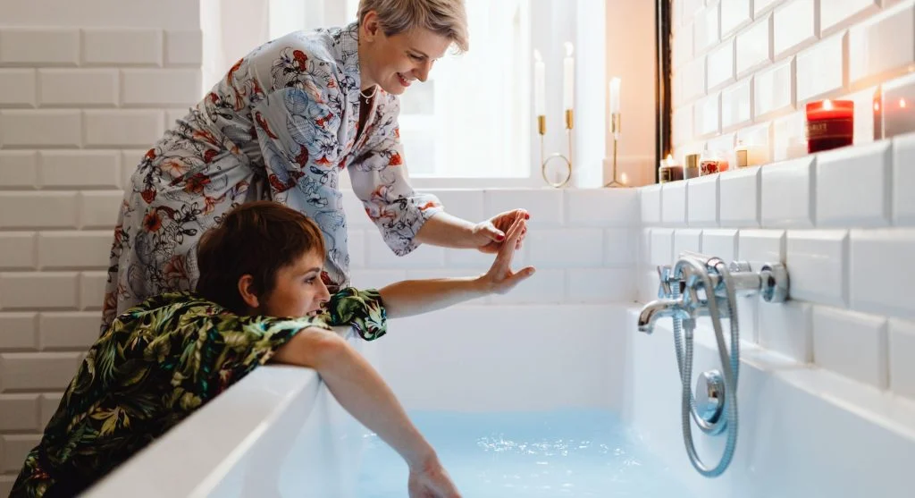 Child seeing a warm towel ready before getting out of the bath