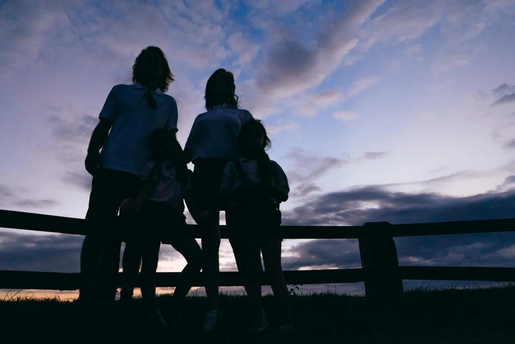 Family sharing a calm repeated drive home ritual together after a day out