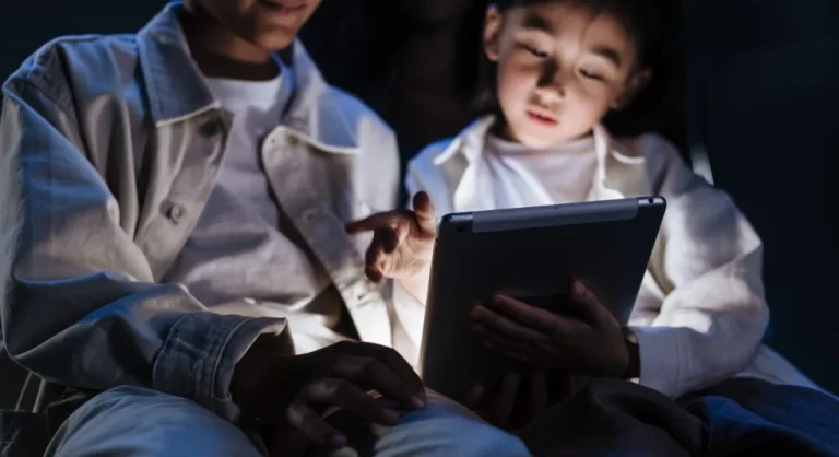 Small light switched on near a family charging spot before screen time ends